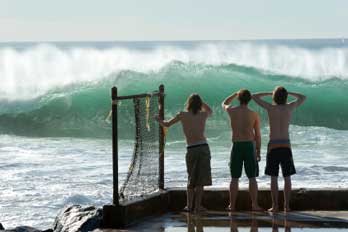 surfers watching waves  at Hermosa Beach,  CA